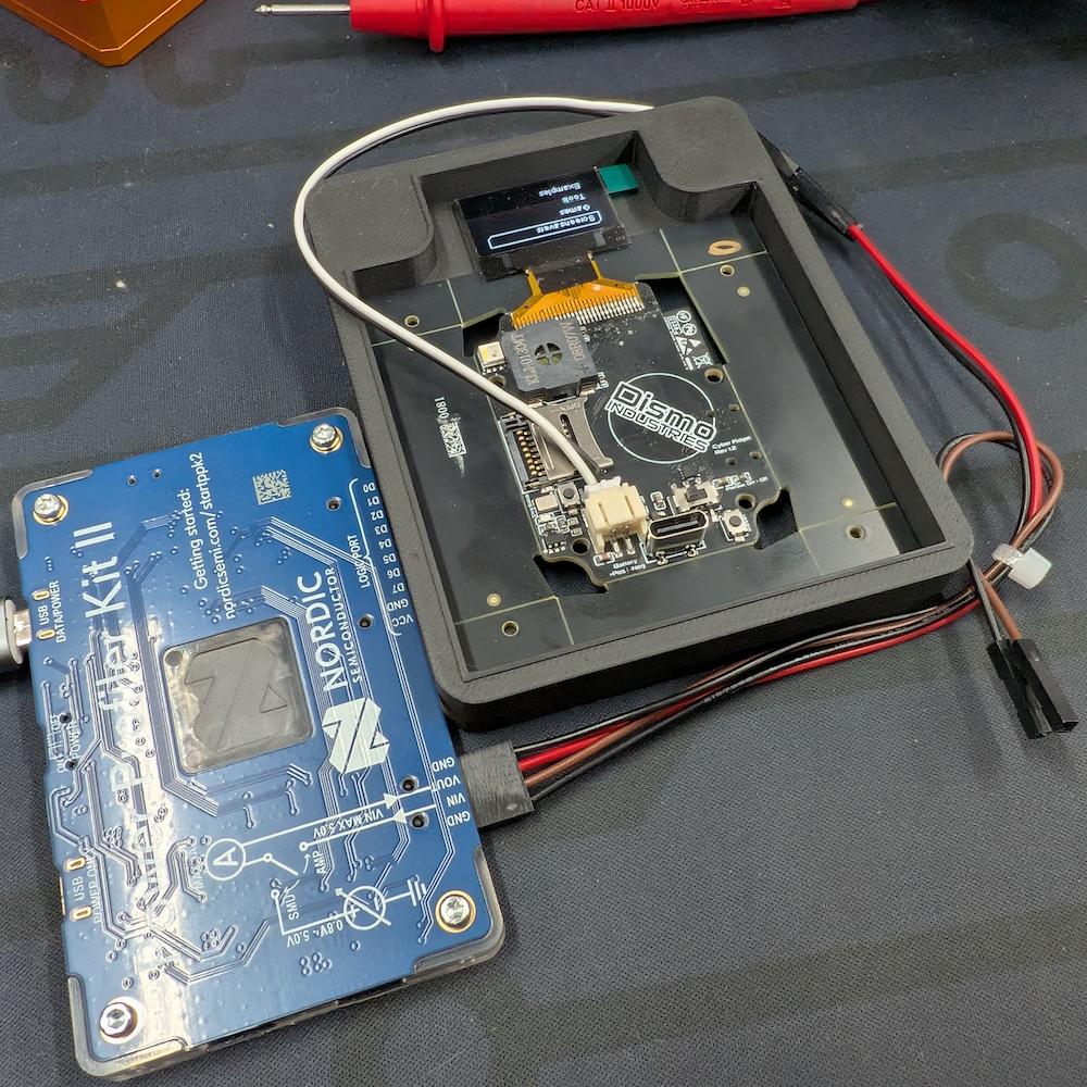 bench setup with PPK2 wired into the JST, Cyber Fidget powered up