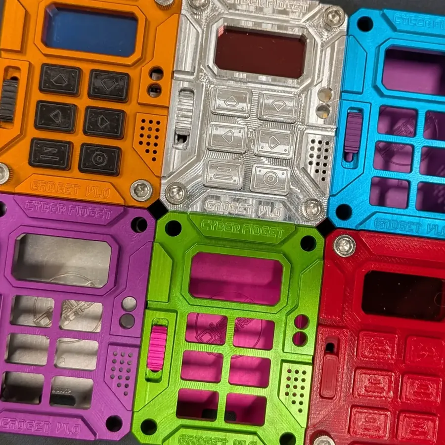 Case fronts in orange, blue, purple, green and red around a raw aluminum one